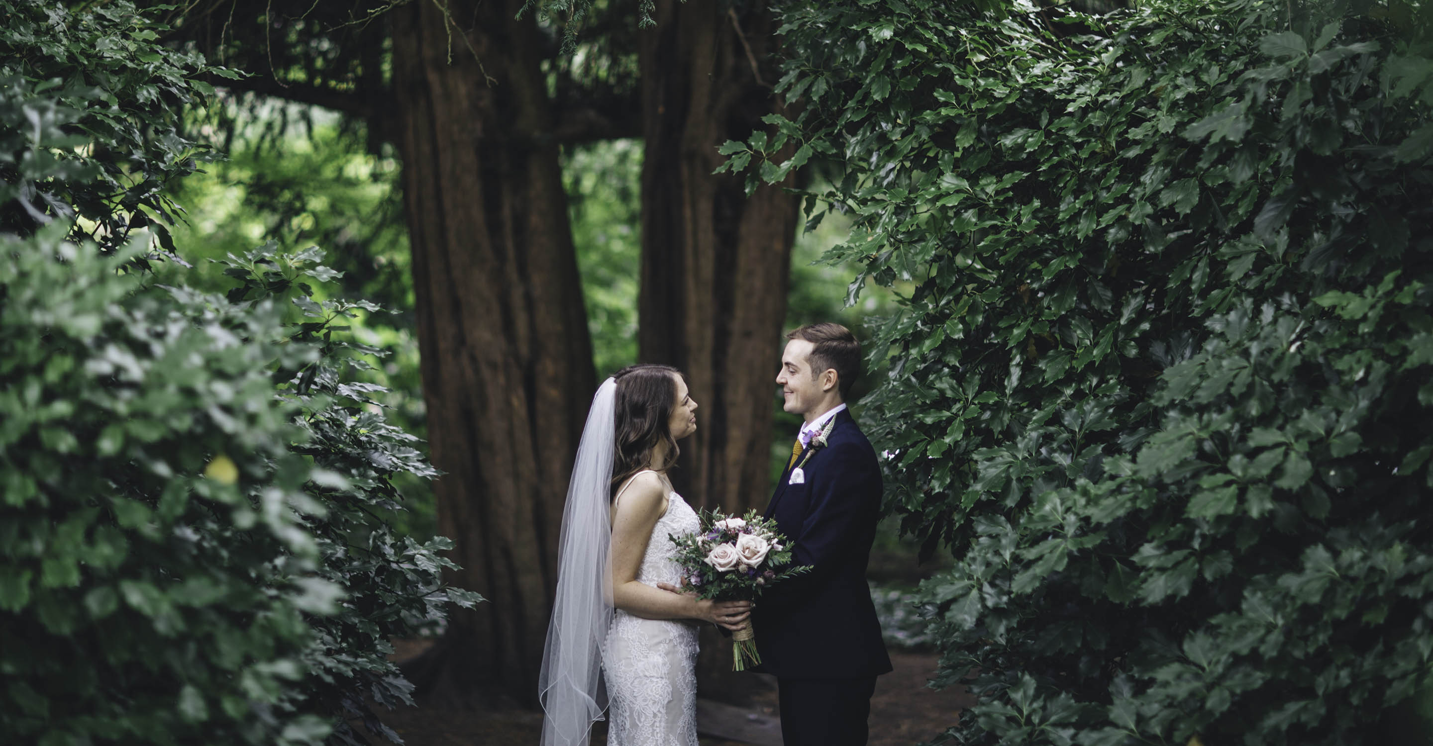 bride and groom in parsonage gardens