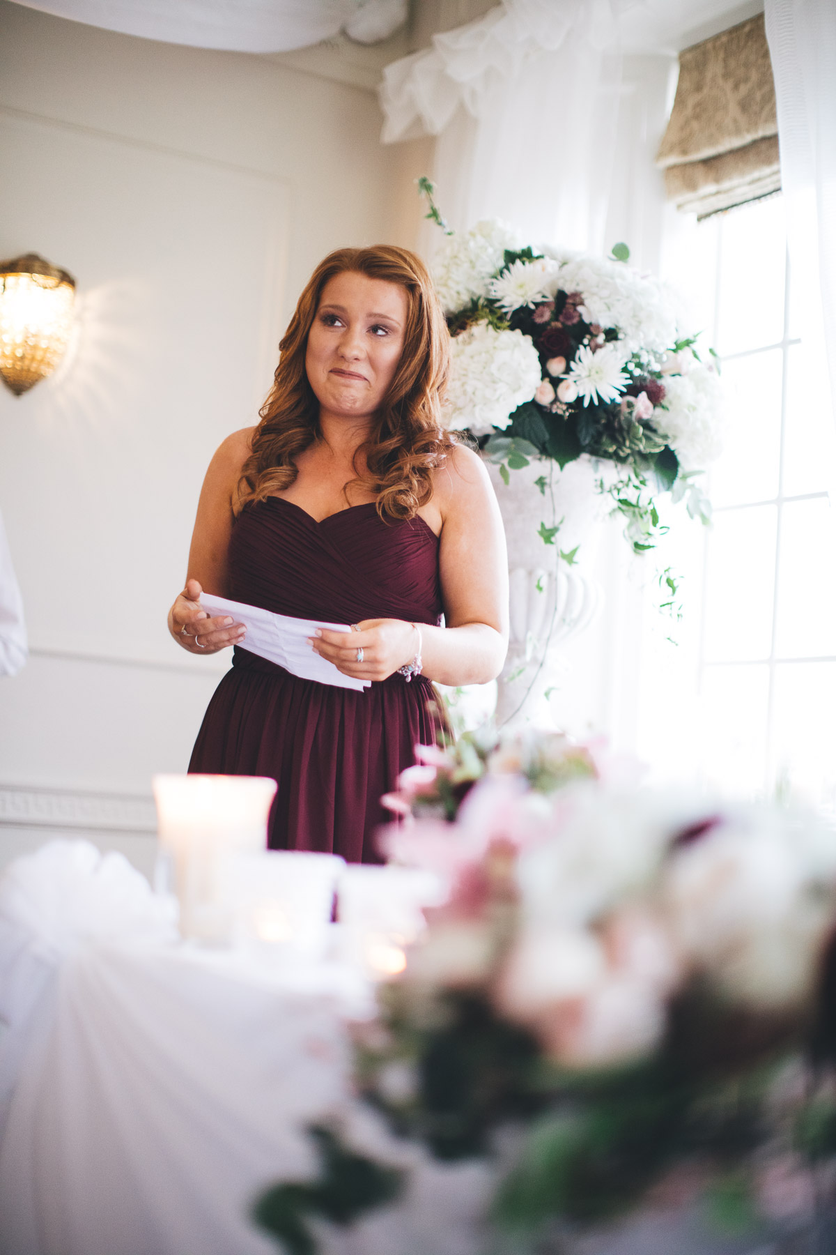 bridesmaid making a speech and getting emtional