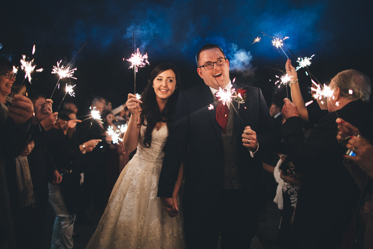 happy couple with sparklers