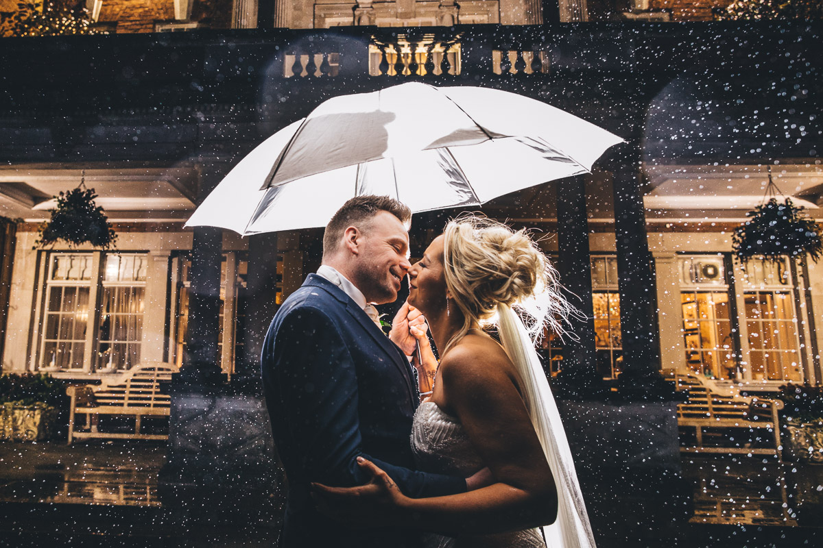 wedding portrait in the rain