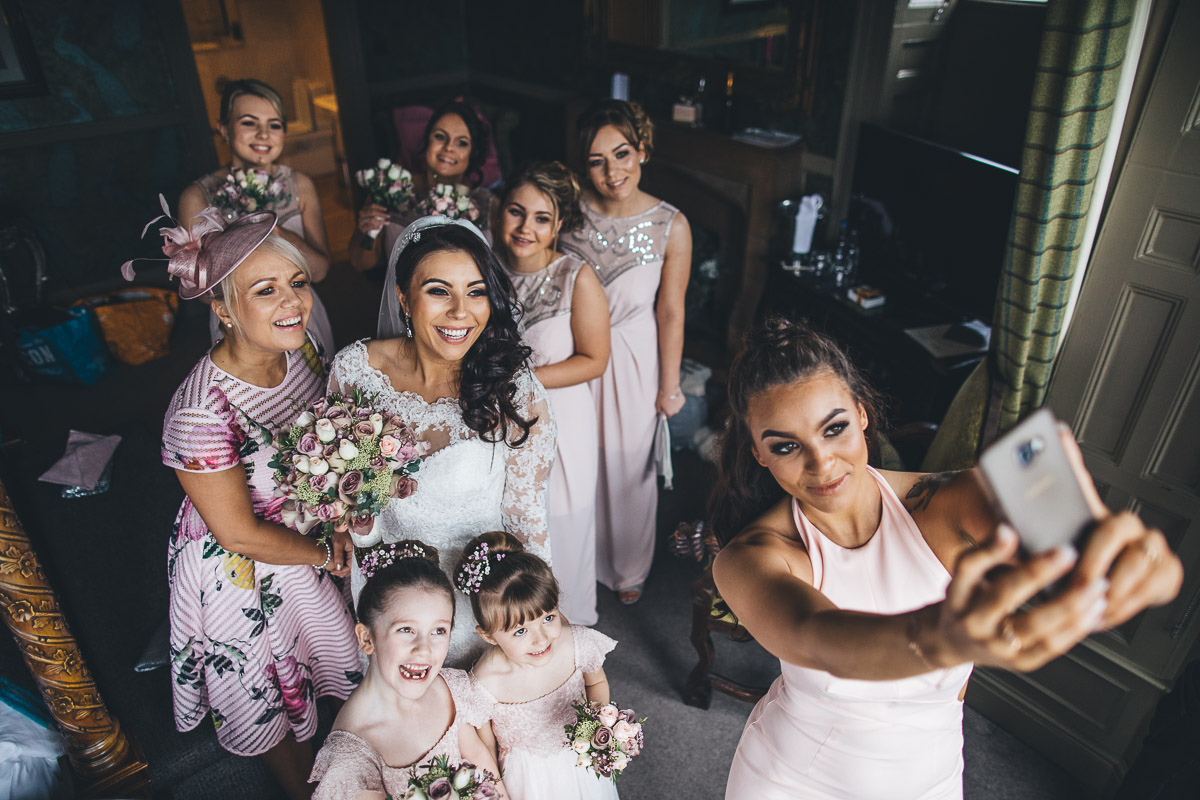 bridesmaid takes a selfie