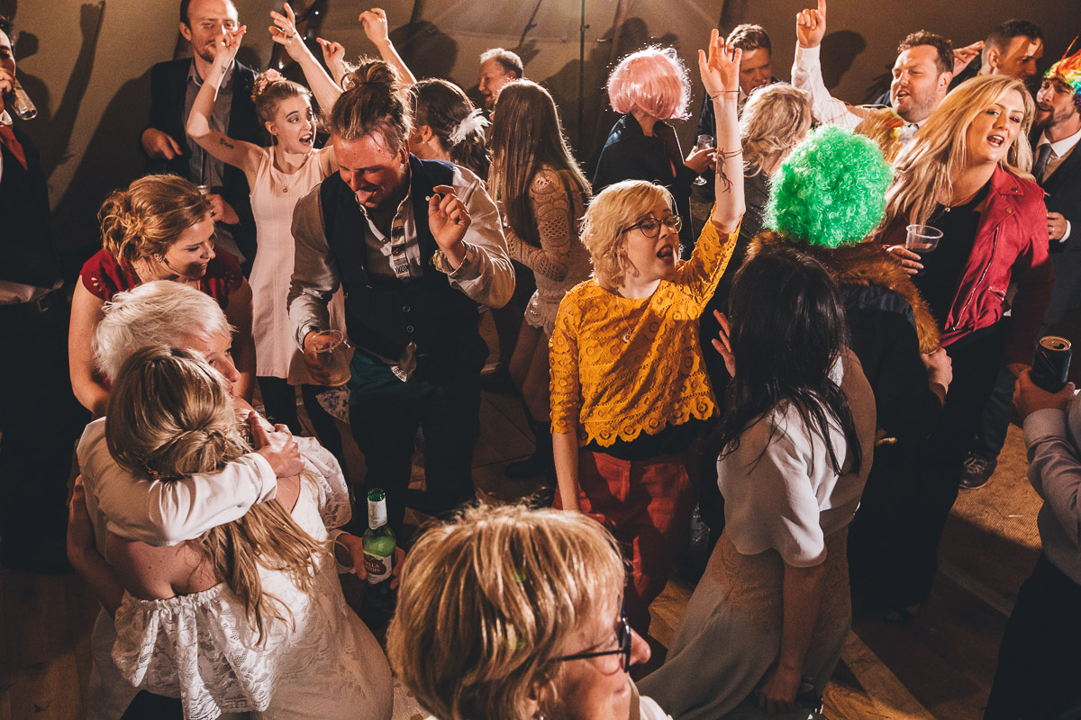 wedding reception inside tipi dancing