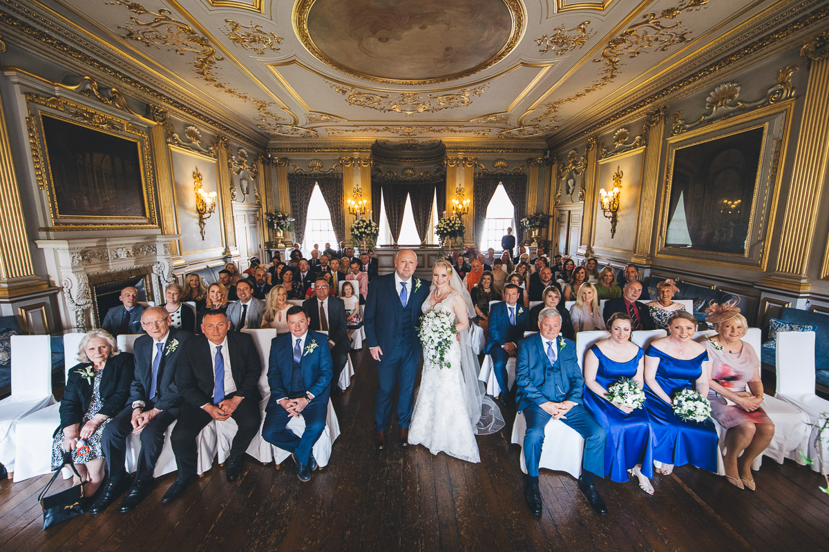 all the wedding guest photographed together after the ceremony