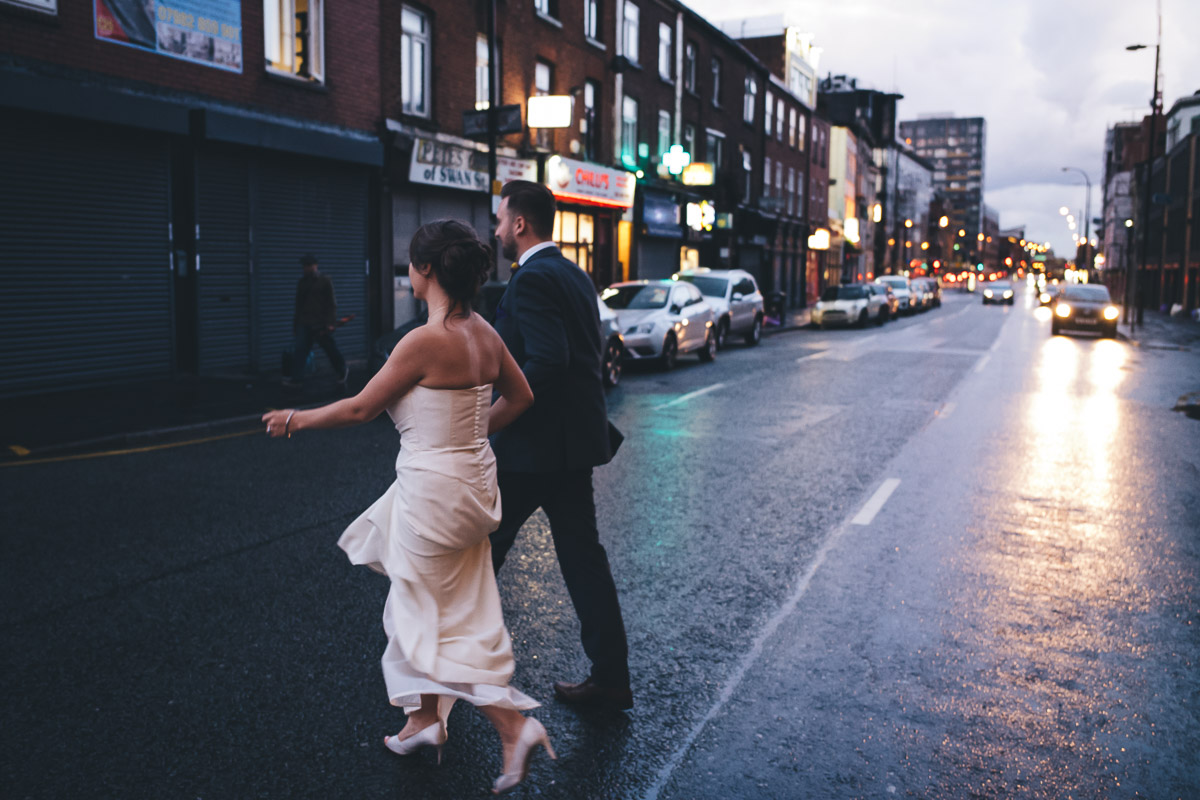 couple cross the road