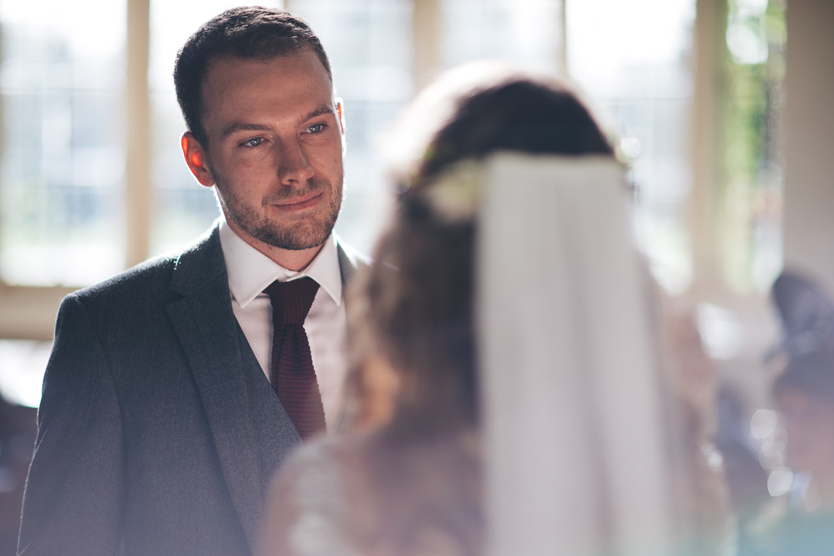 huw the groom during the ceremony