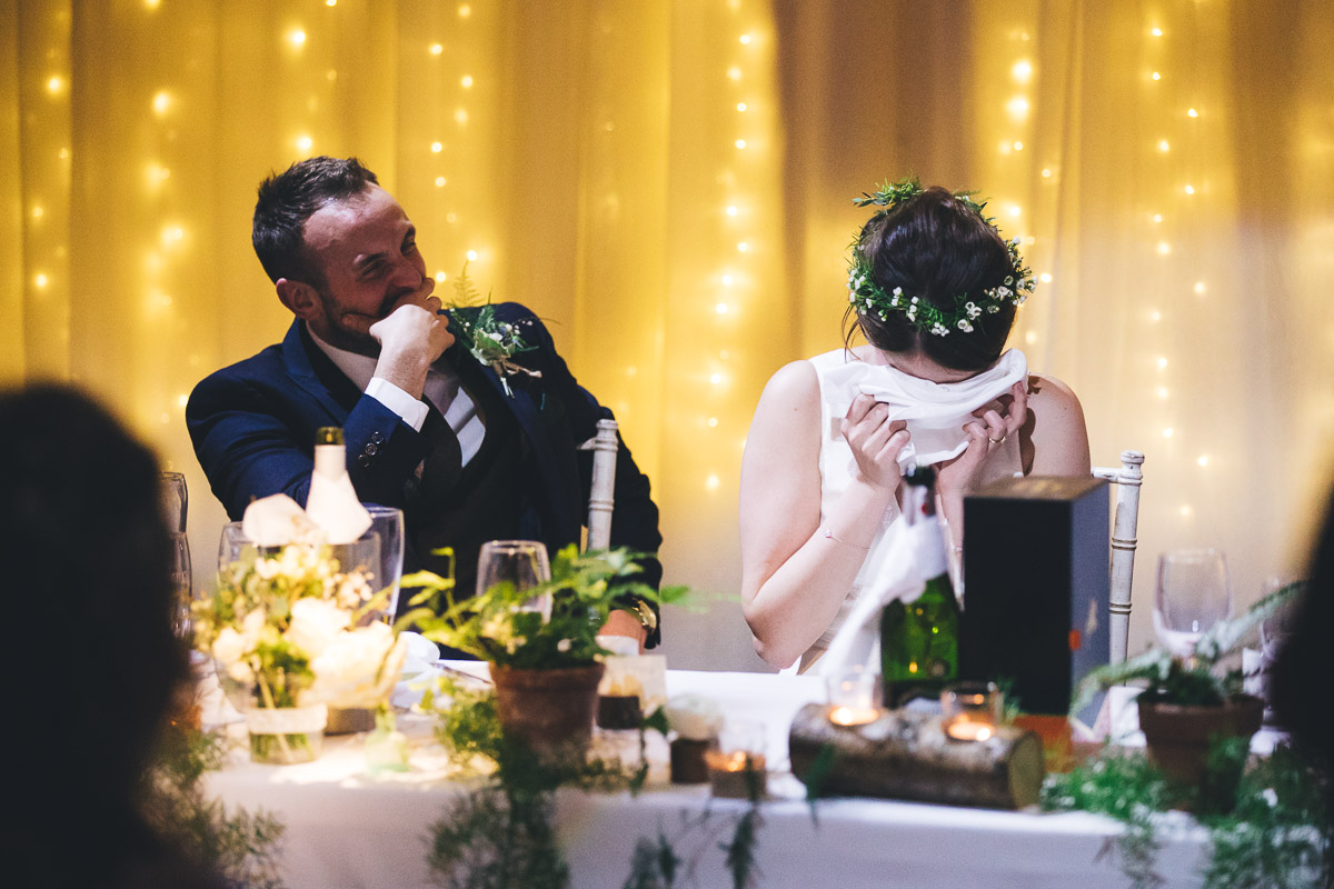 Bride and Groom laughing Crying Fairylights Plants