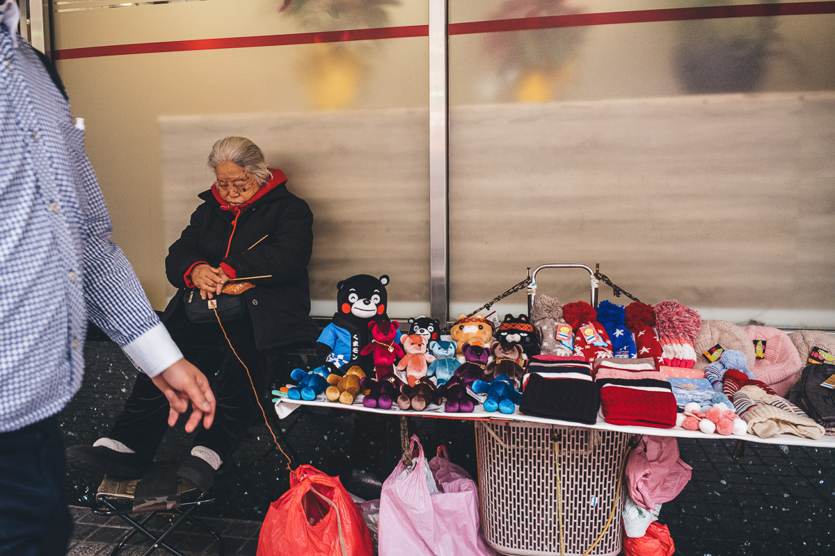 lady asleep with her knitting needles