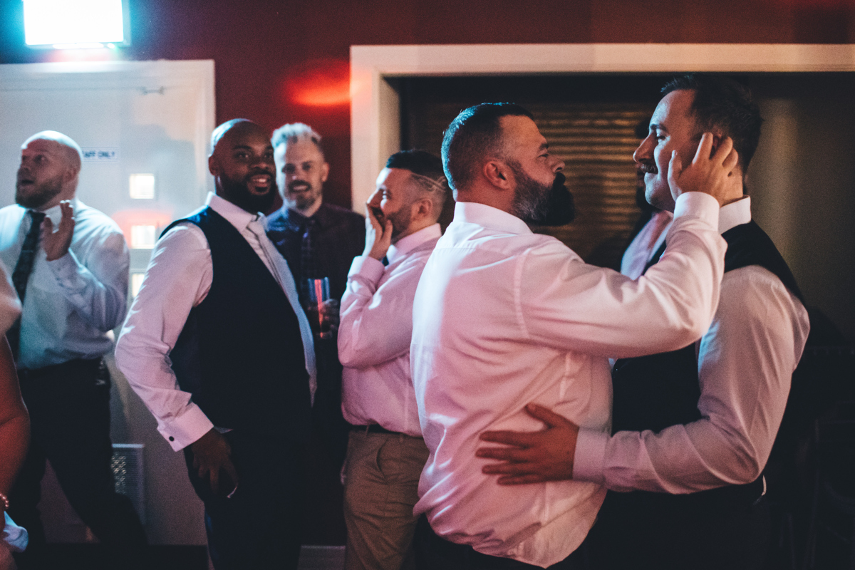 Two men dancing together