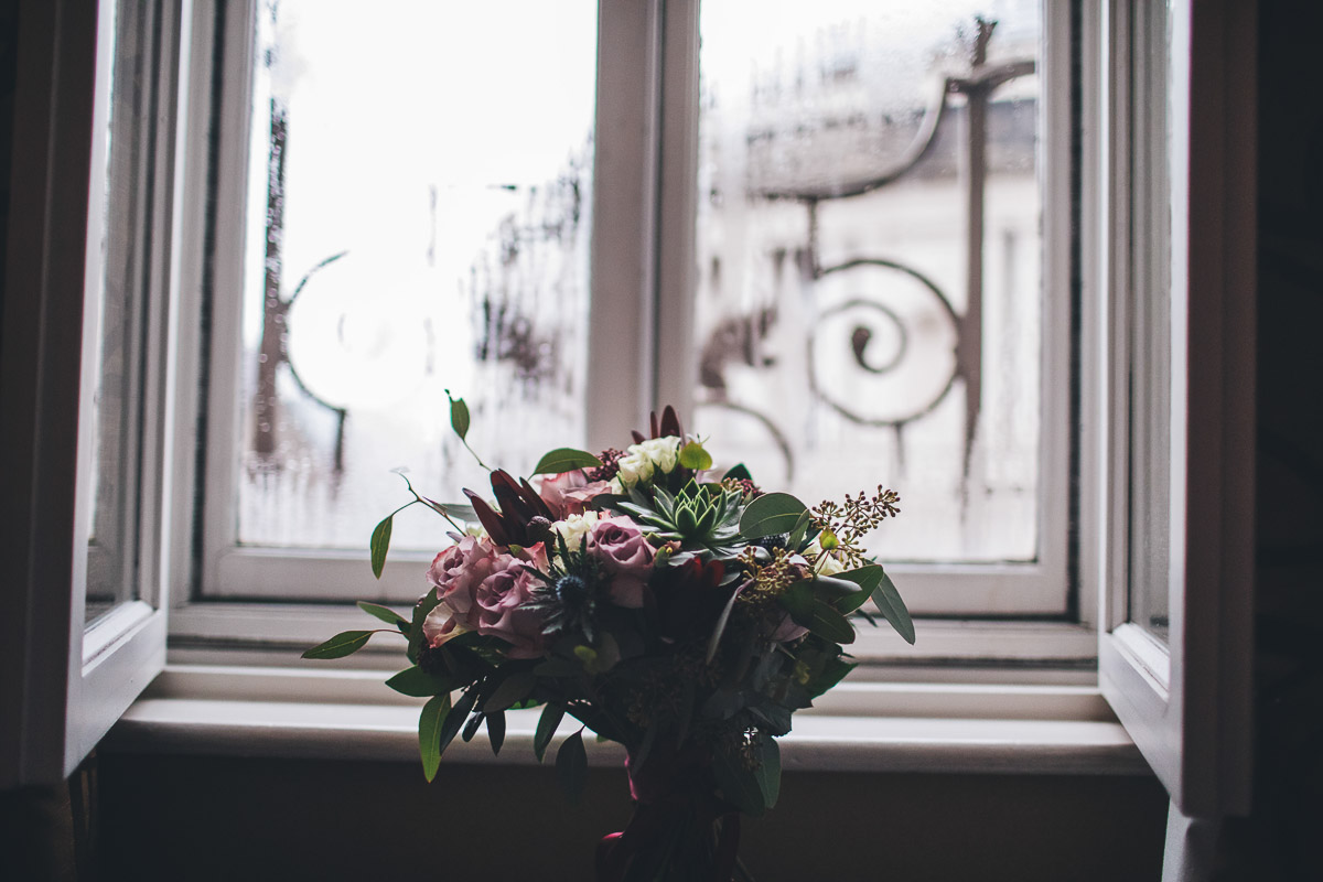 Brides bouquet in the window at the Midland Hotel