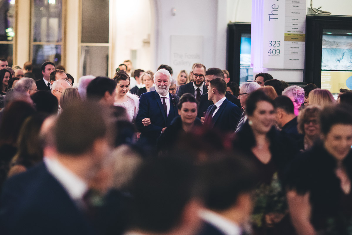 Bride coming down the aisle with her father
