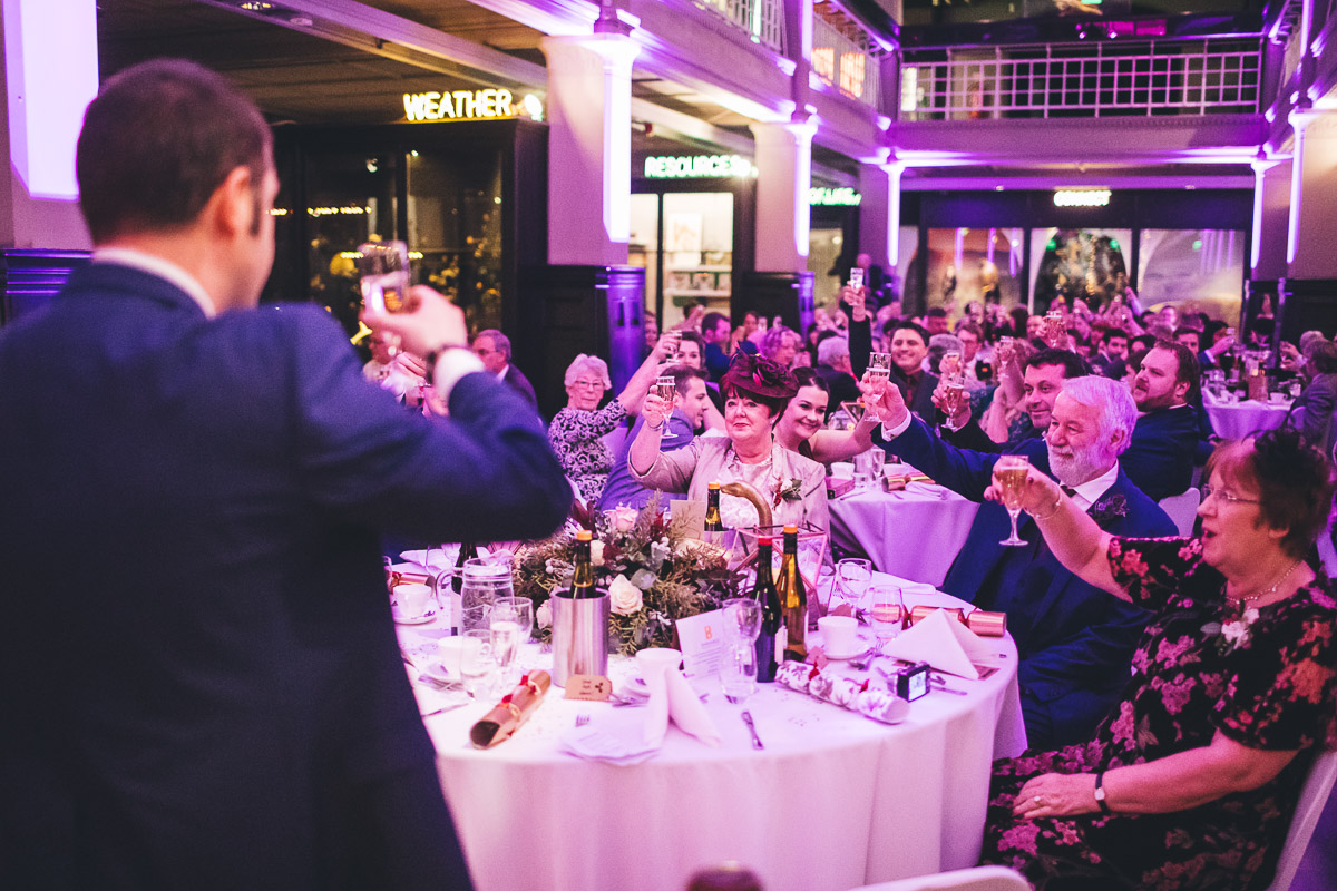 Wedding party raising a glass