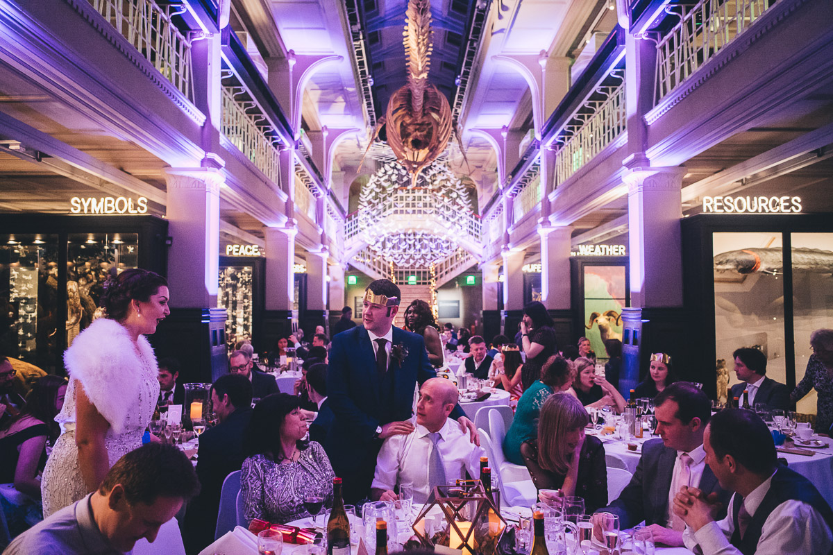 Bride and groom chatting with the wedding party guests