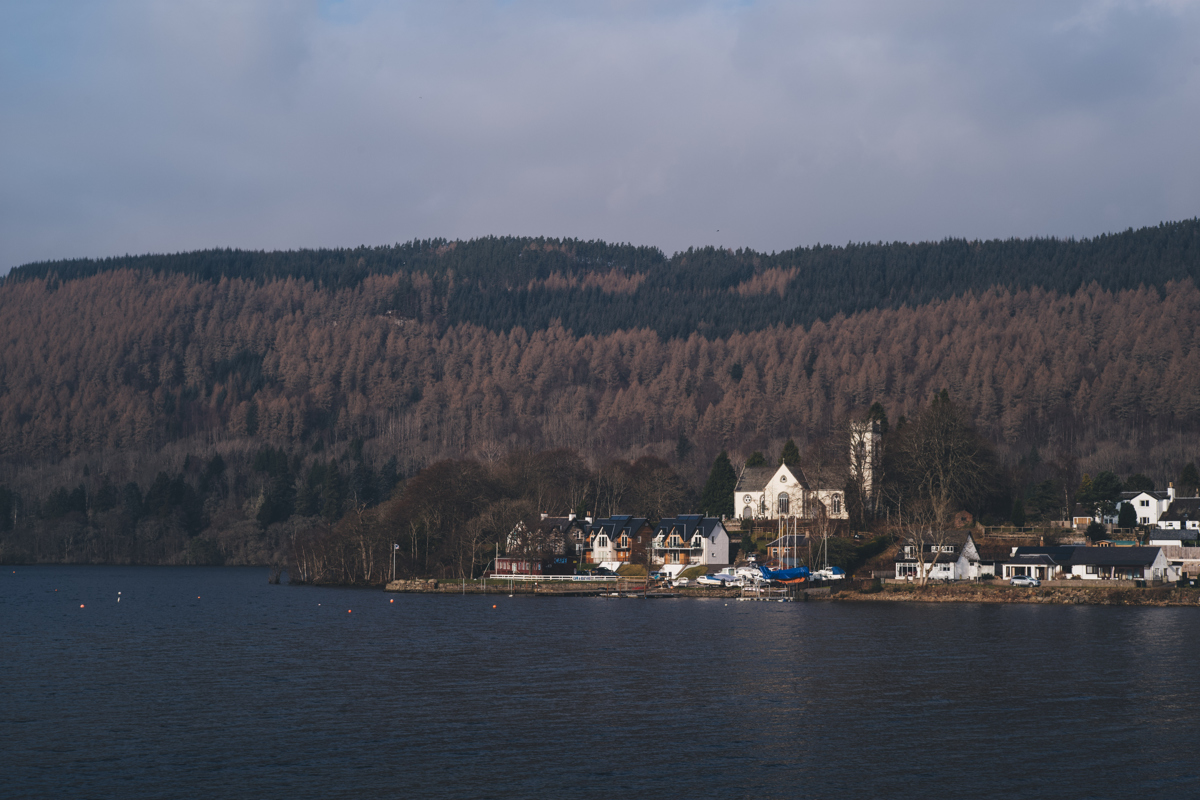 A view across a loch towards Kenmore