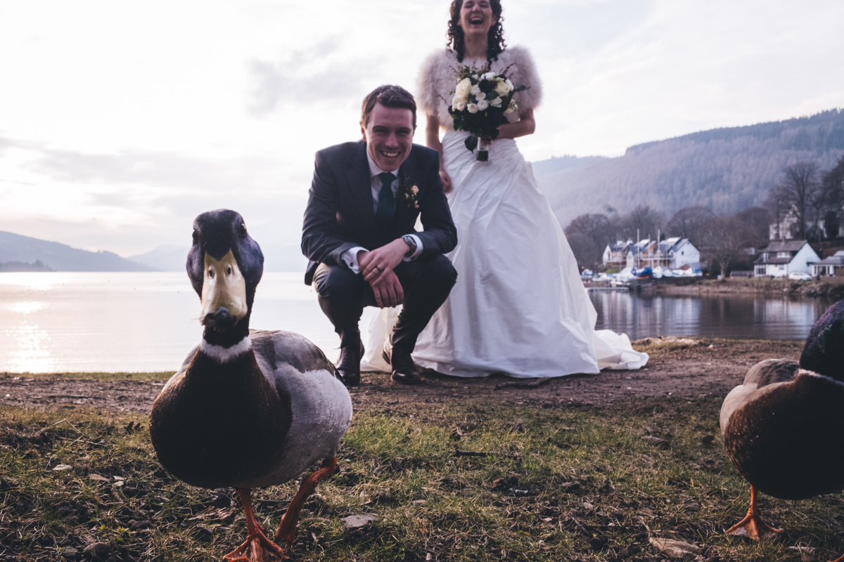 Bride and Groom photobombed by a duck