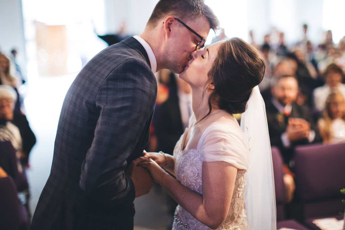 Bride and groom's first kiss as man and wife