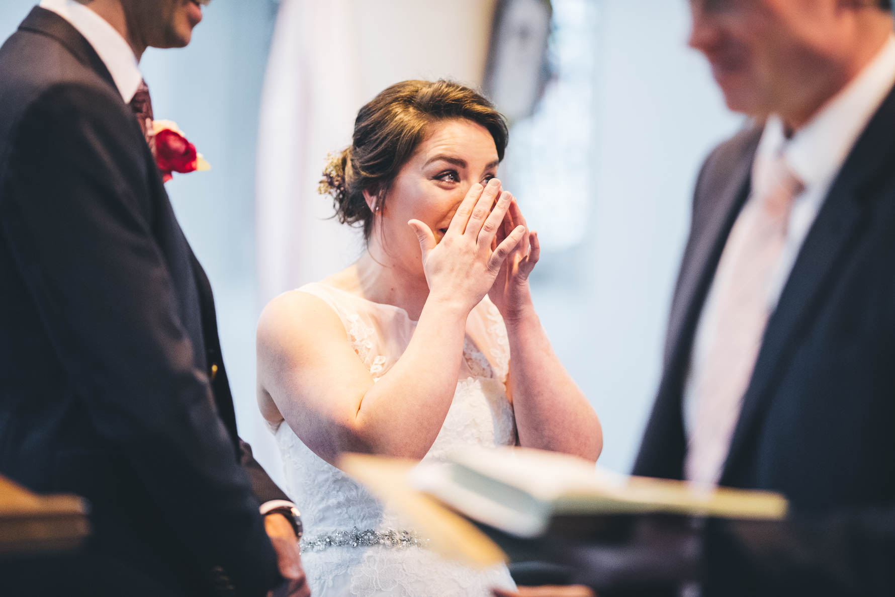 bride cries during the wedding ceremony