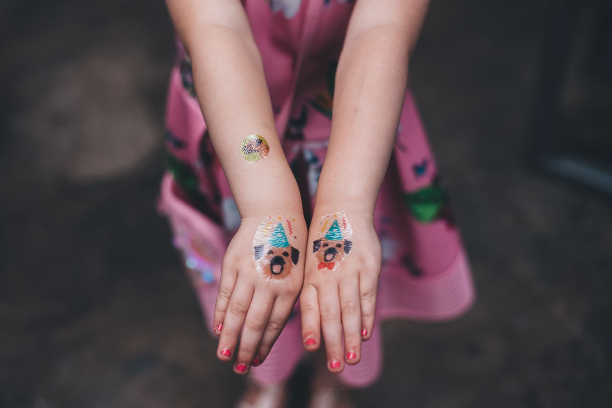 close up of tattoos on hands
