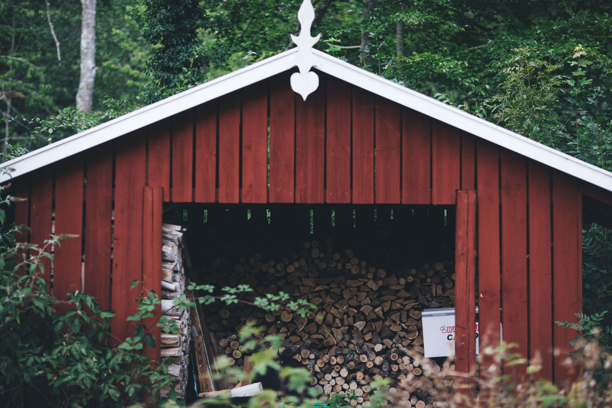 swedish red wood store in the forrest