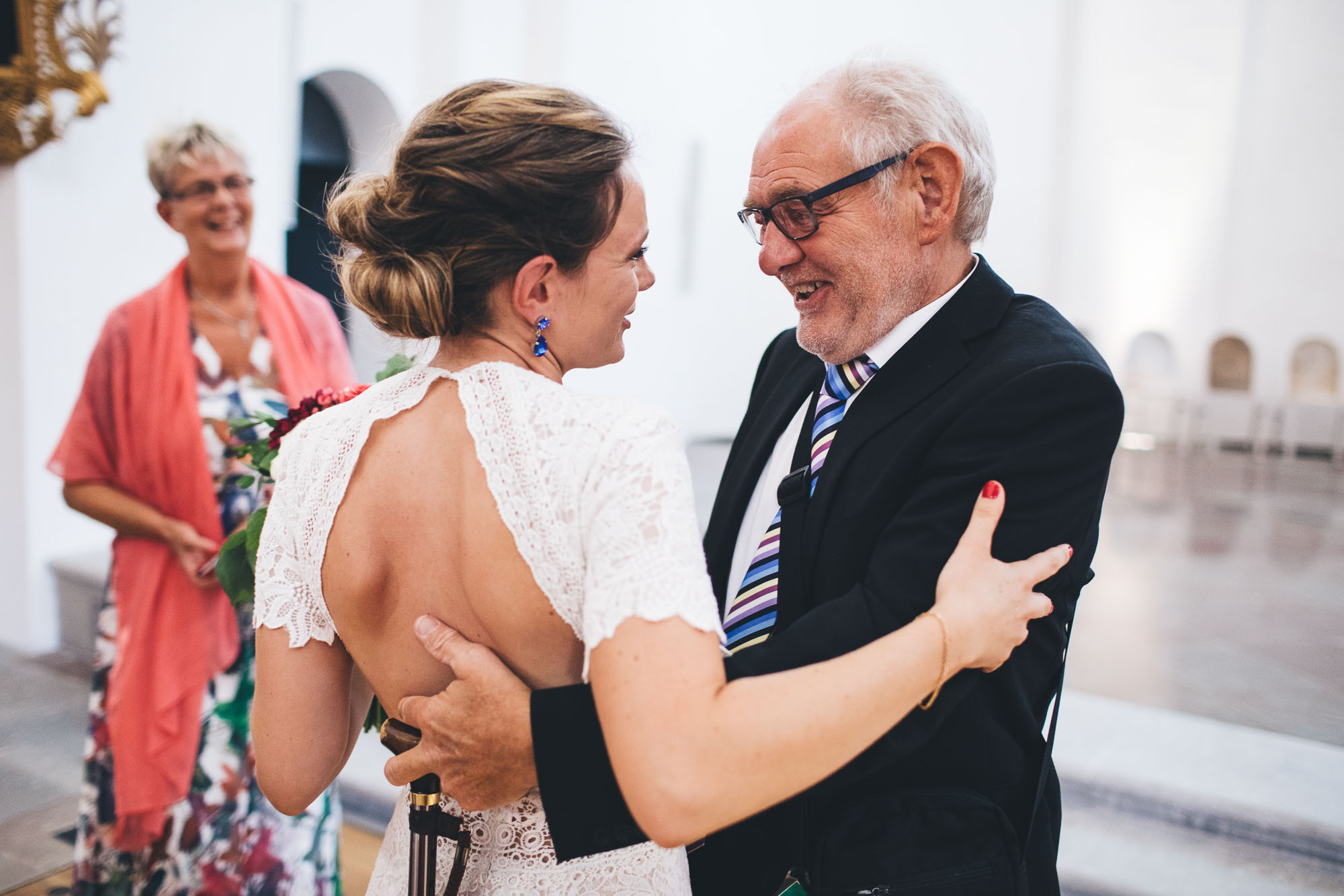 bride hugs grandad