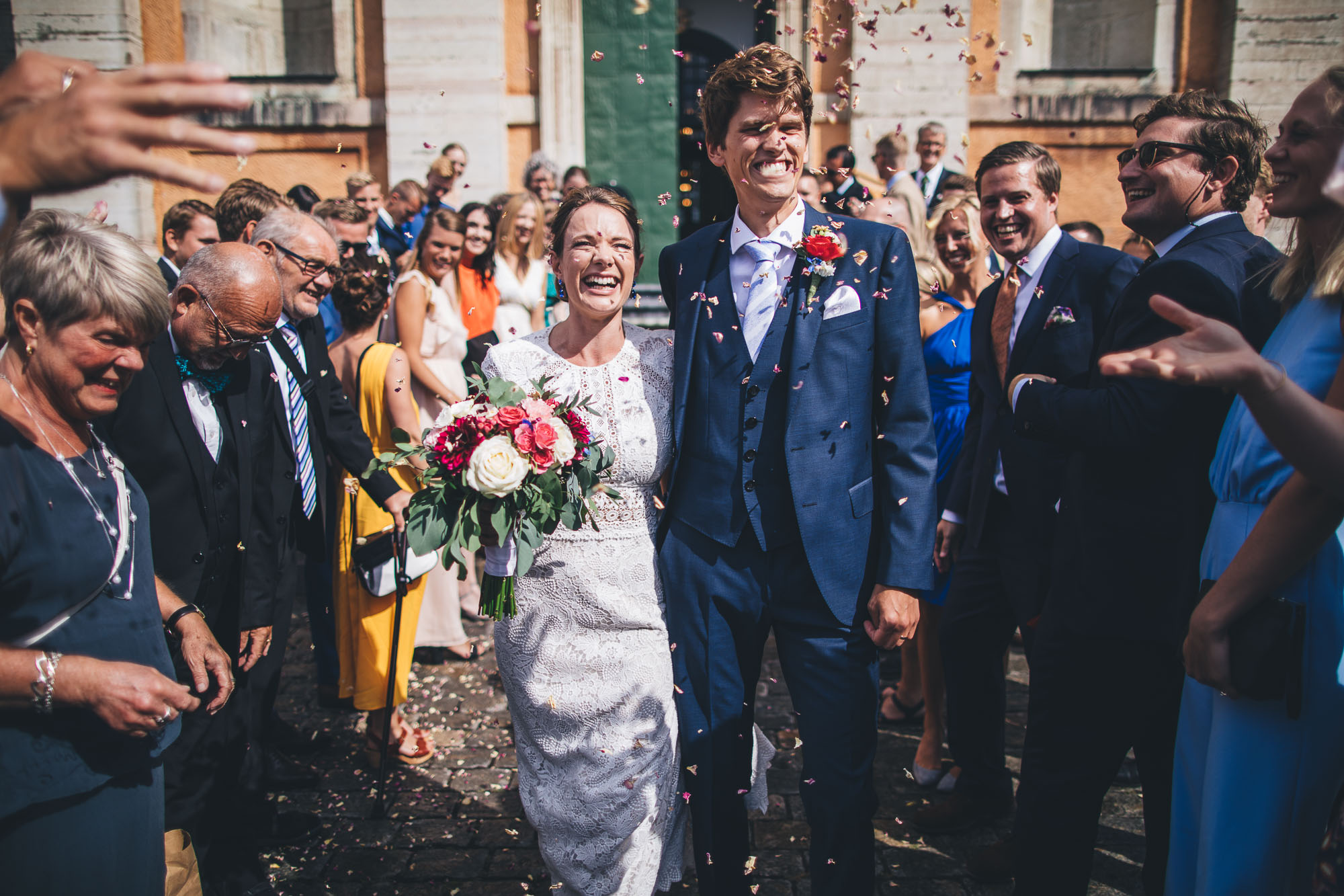 couple gets confetti thrown on them