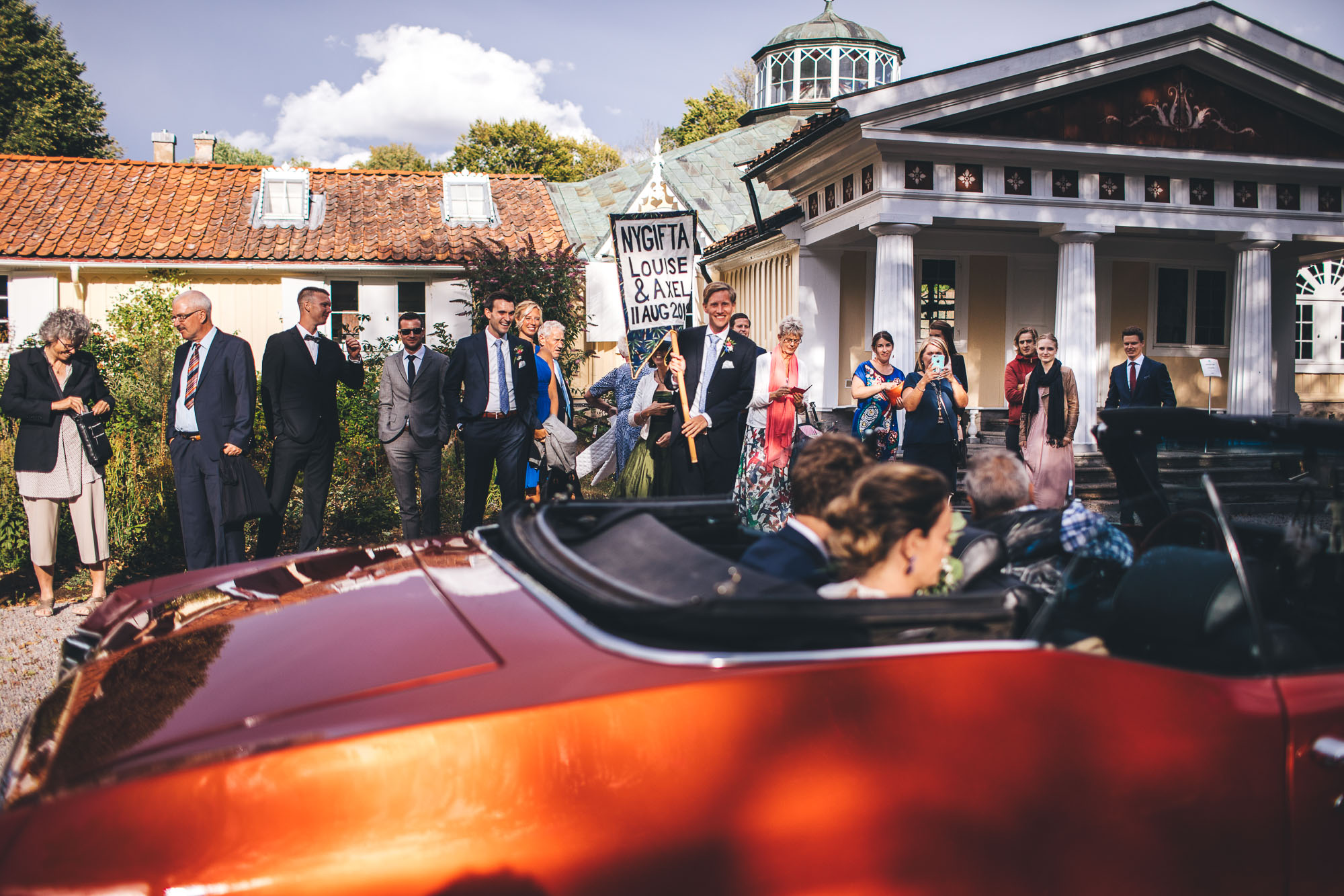 couple arrive at reception venue
