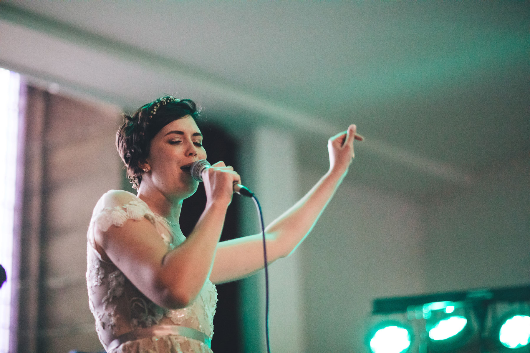 bride sings at her own wedding