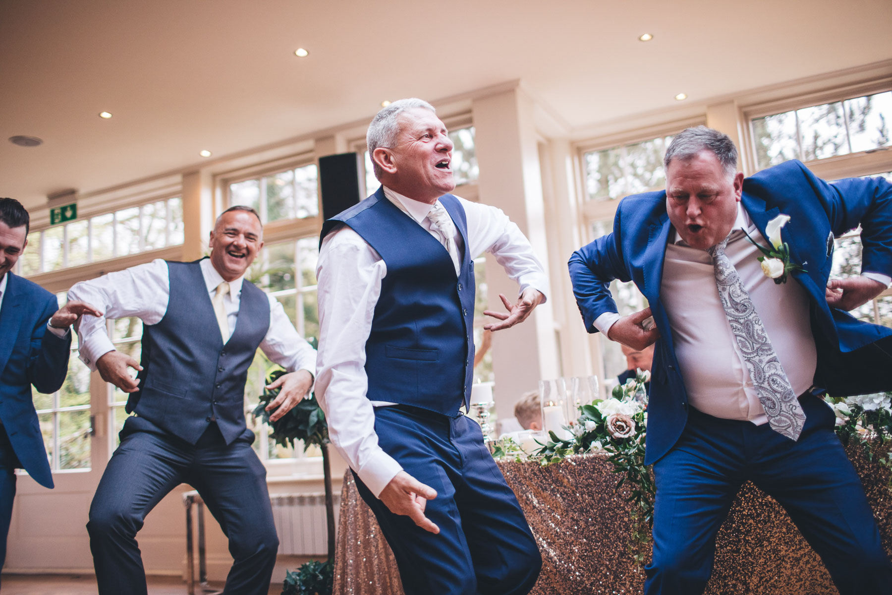 groomsmen doing a monkey dance