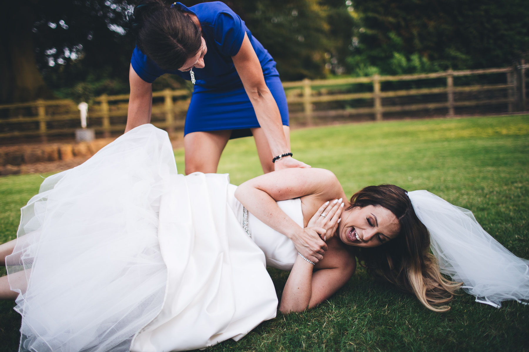 bride falls on floor after being used as a dumbell