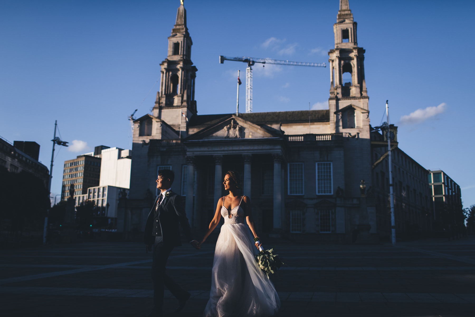 couple in beautiful light in wedding portrait in manchester