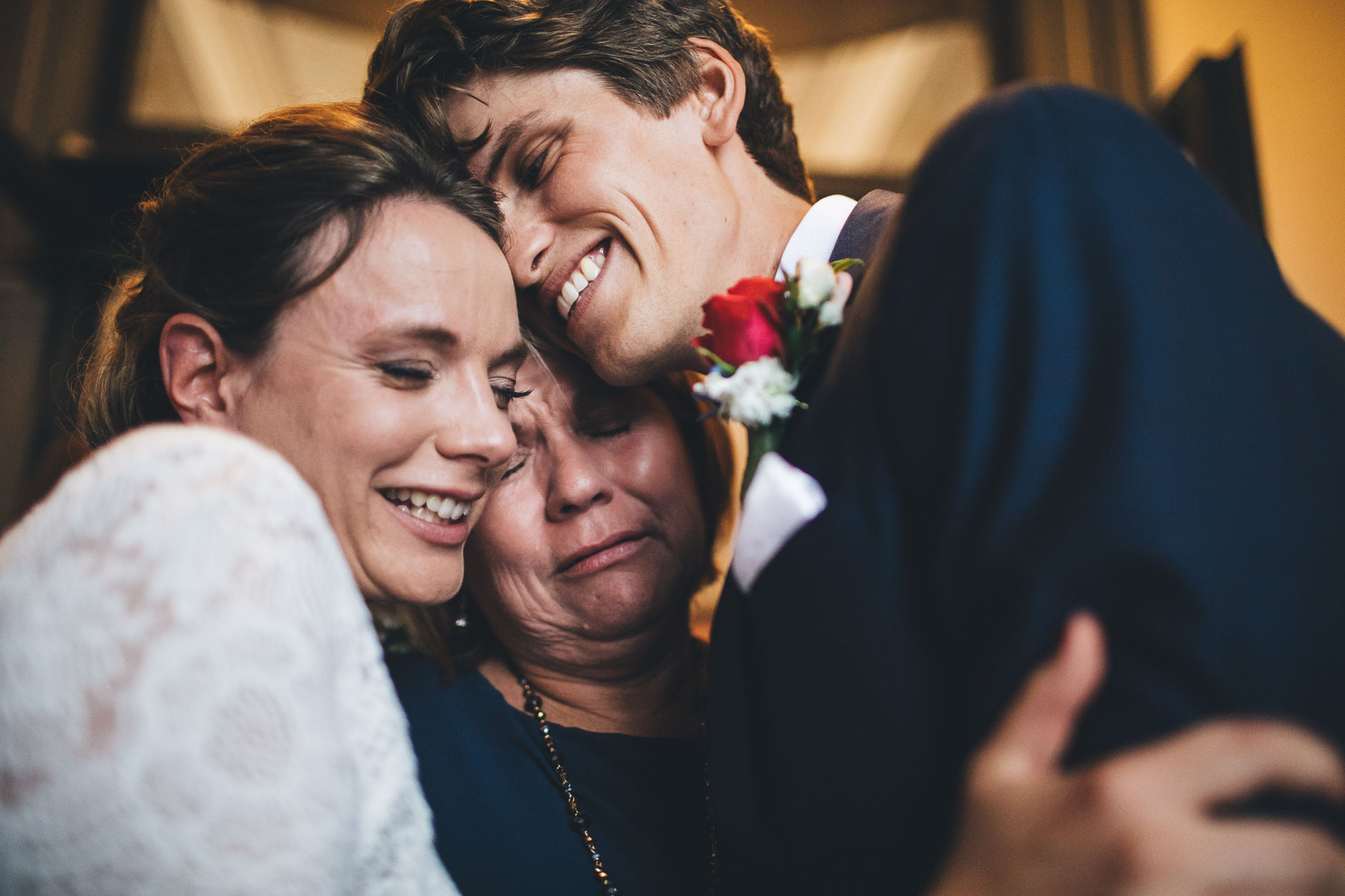 an emotional happy hug after the wedding ceremony