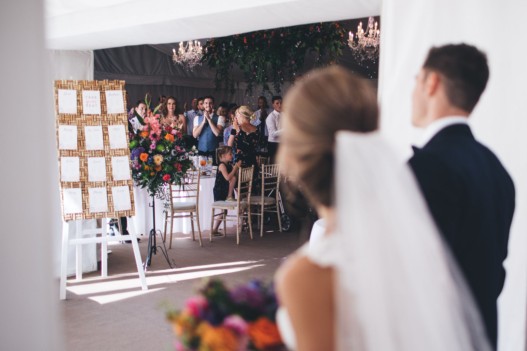 couple enter their wedding breakfast