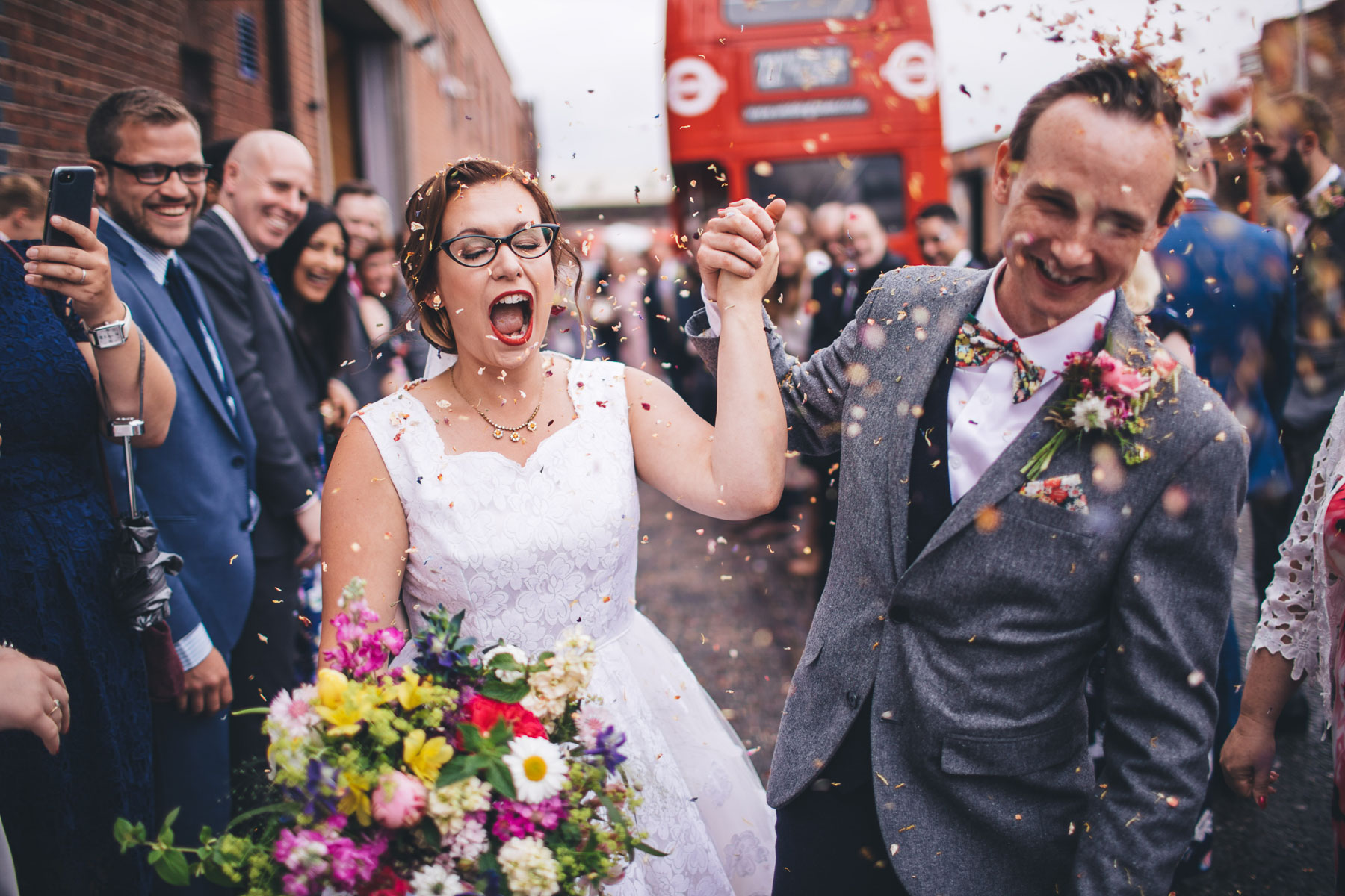 bride is open mouthed during her confetti moment