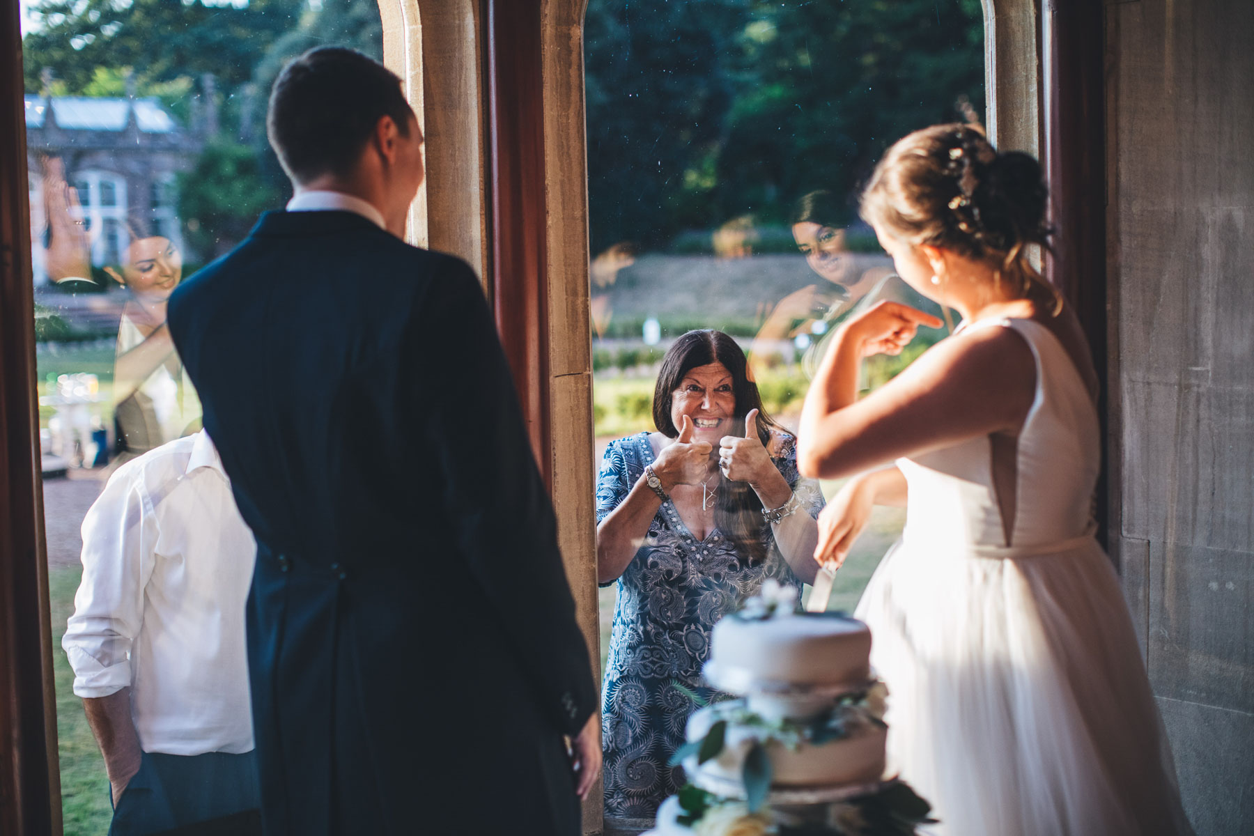 thumbs up at cake cutting