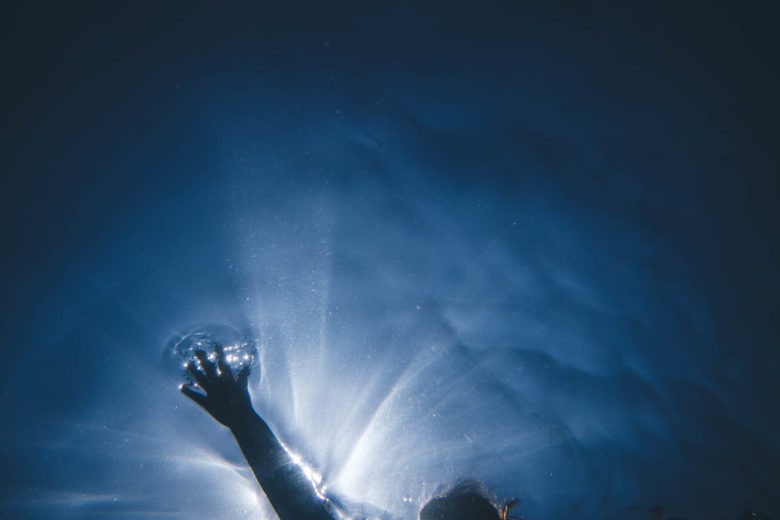 an alternative underwater portrait of just a hand