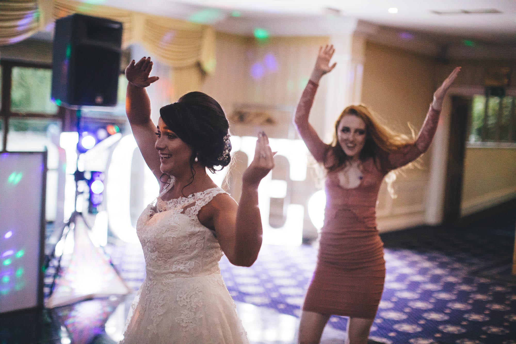 Bride and guest do the YMCA at Wedding Disco