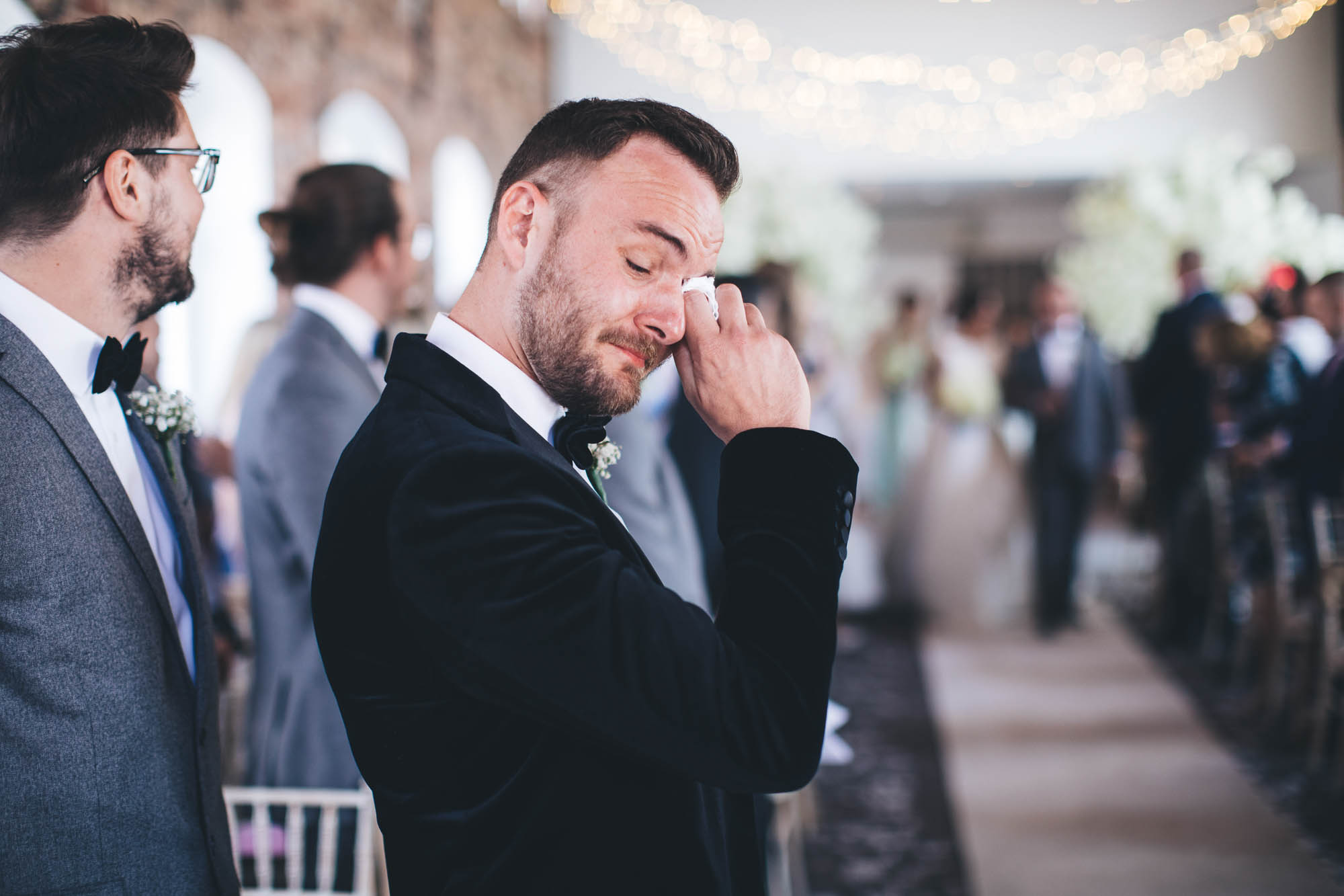Emotional groom as Bride walks down the aisle