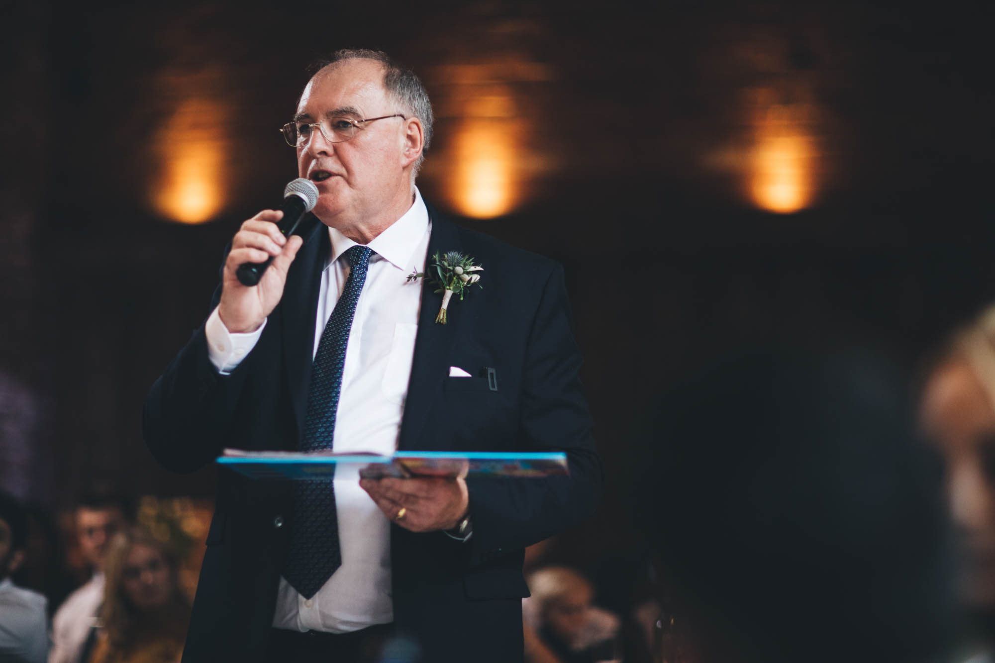 Father of Bride reads from children's book at wedding speech