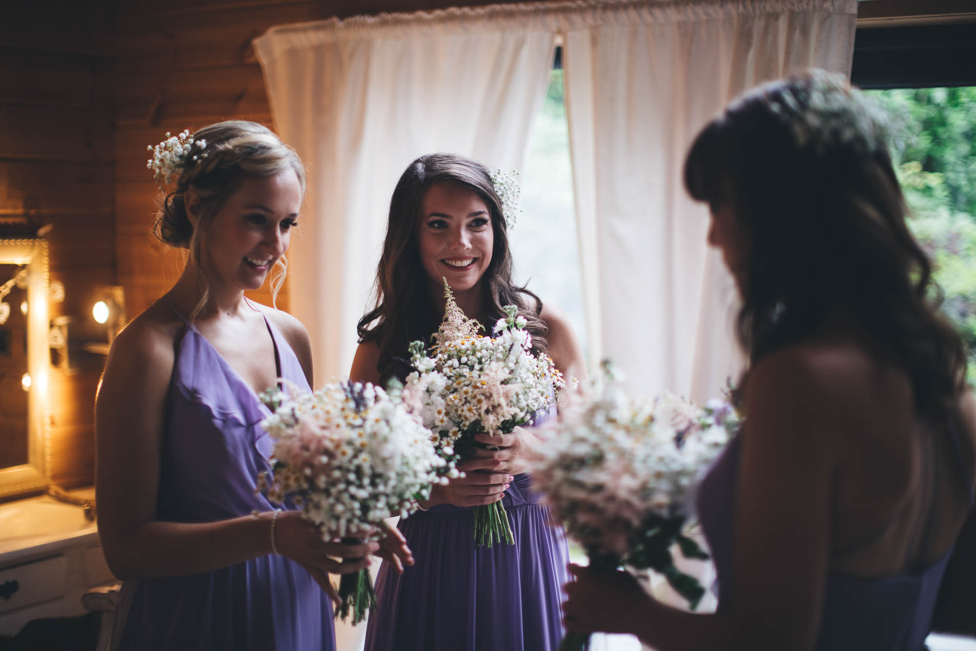 BRIDEMAIDS WITH FLOWERS