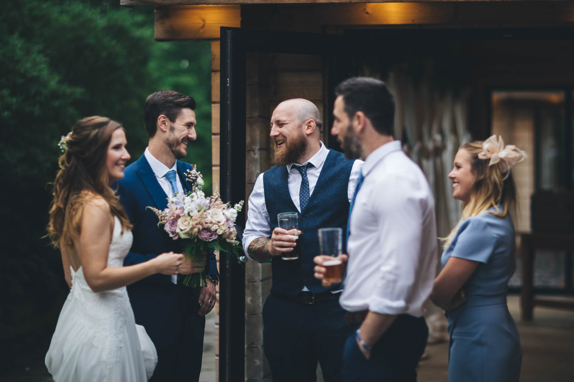 GUESTS ENJOYING THEIR RECEPTION DRINKS