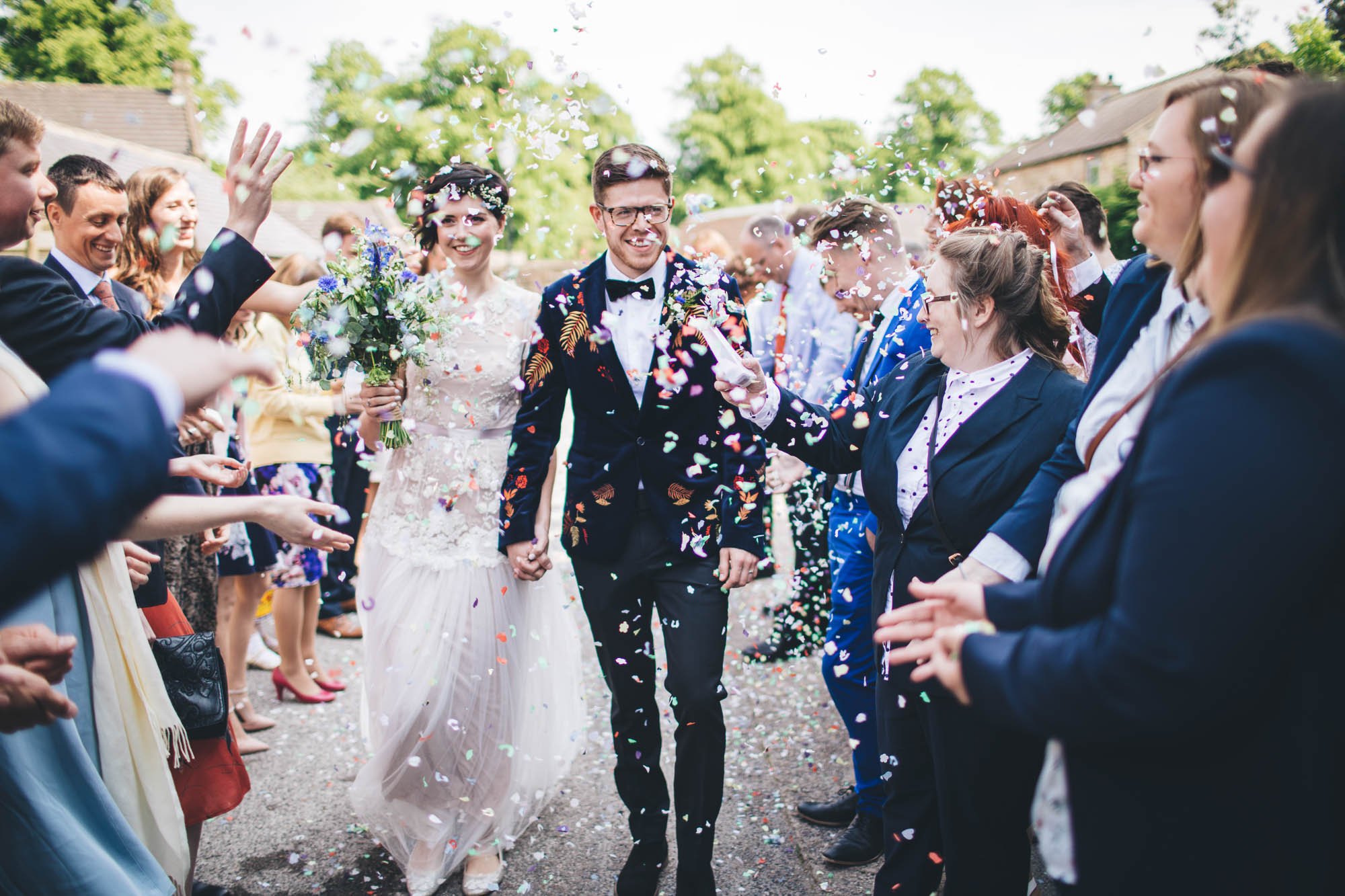 confetti throw on the wedding couple