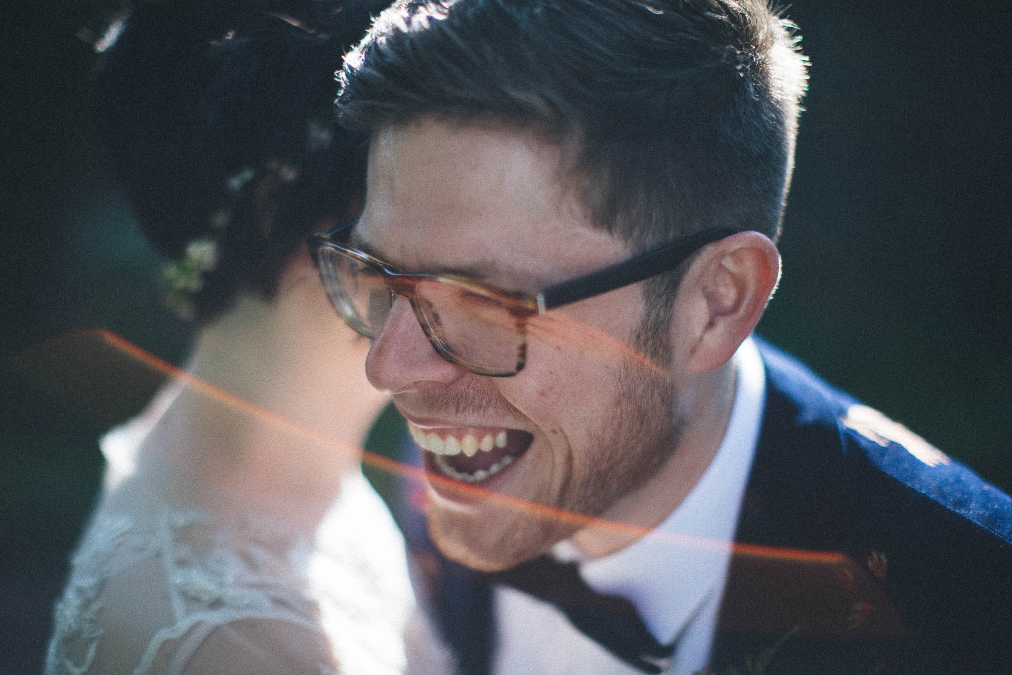 close up of Tom laughing