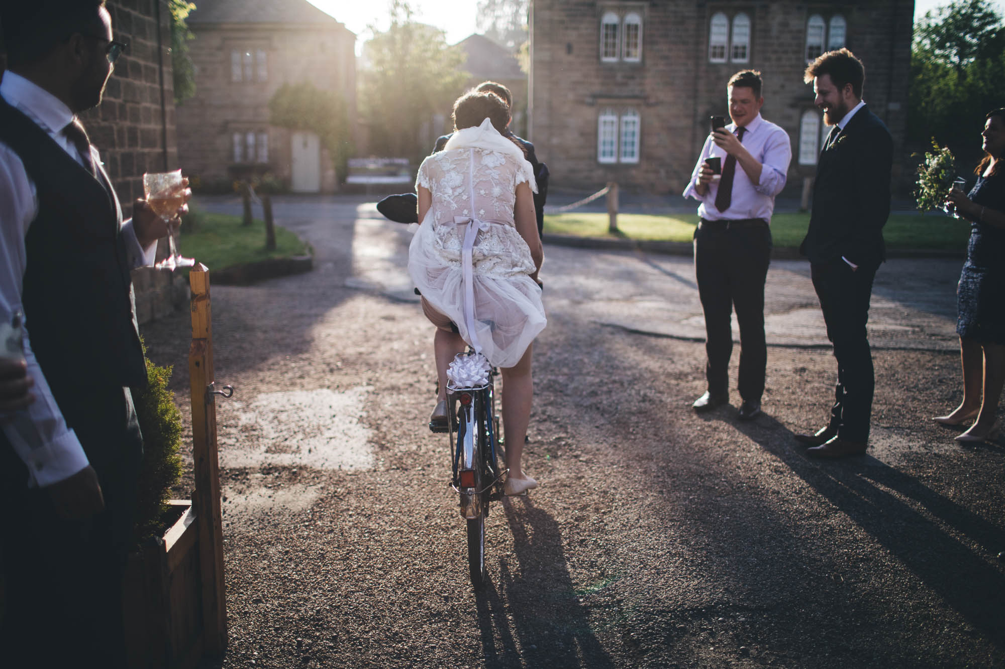wedding dress tucked in so bride can cycle