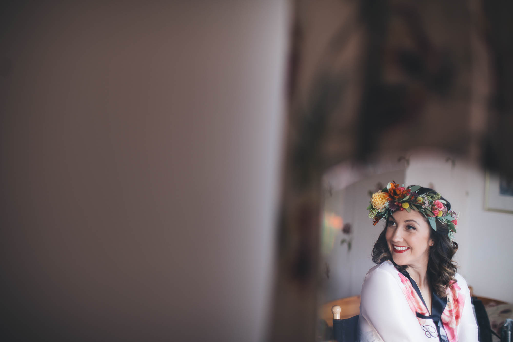 the bride tries on her flower crown