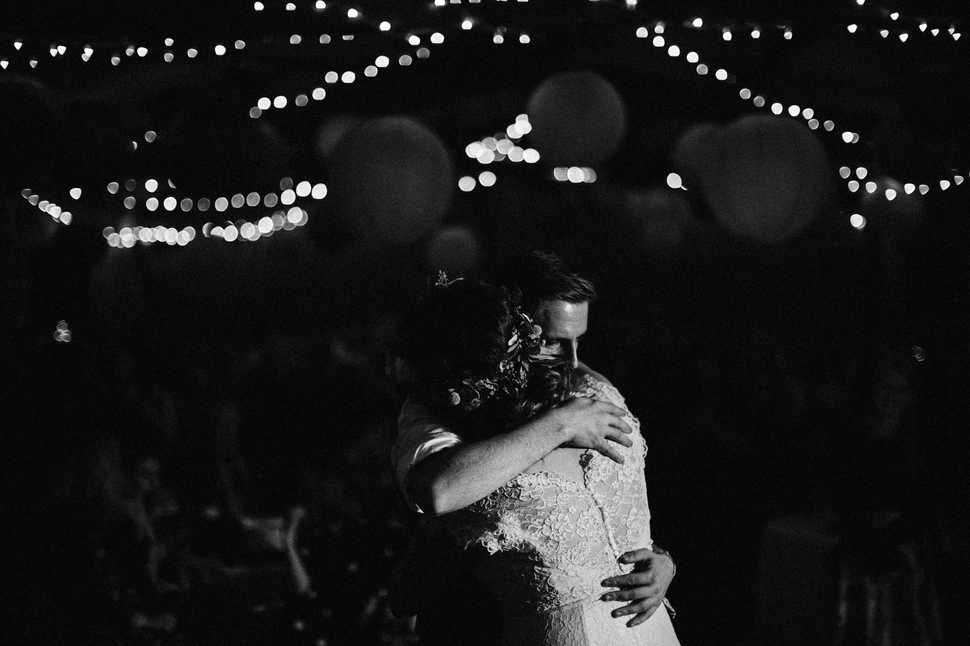 couple embrace during the first dance