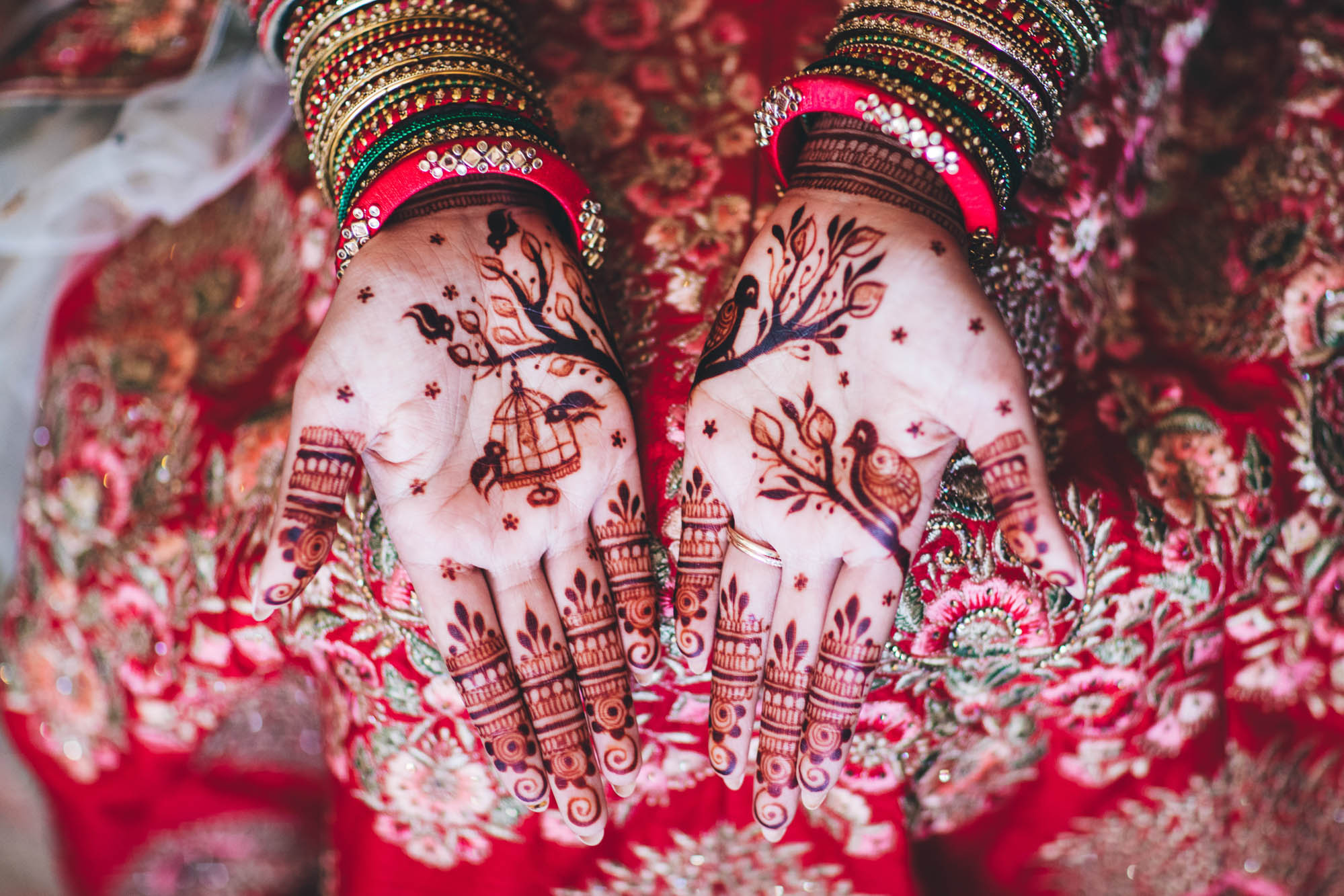 close up shot of details henna on brides hands