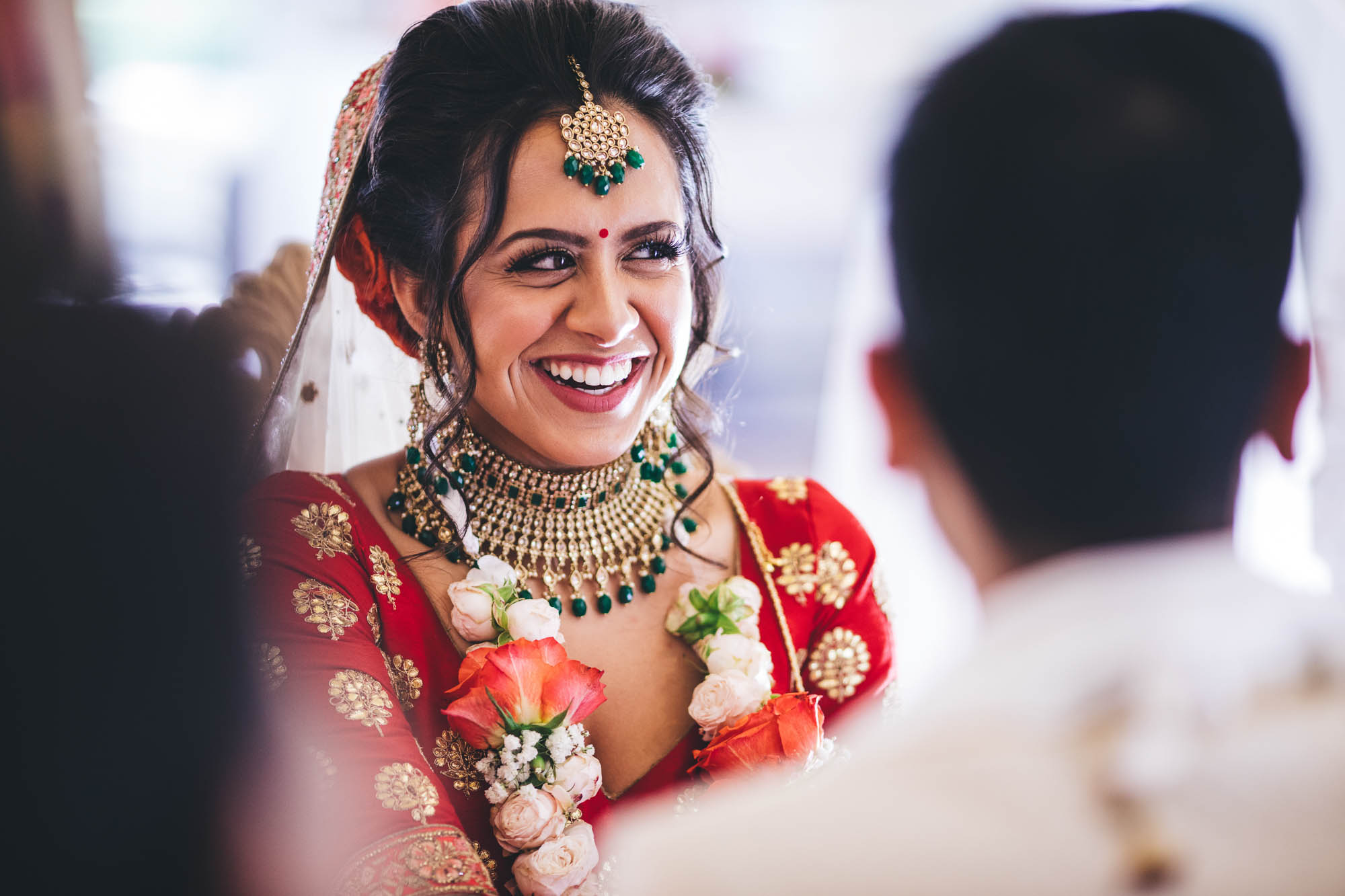 close up of reena during her wedding ceremony