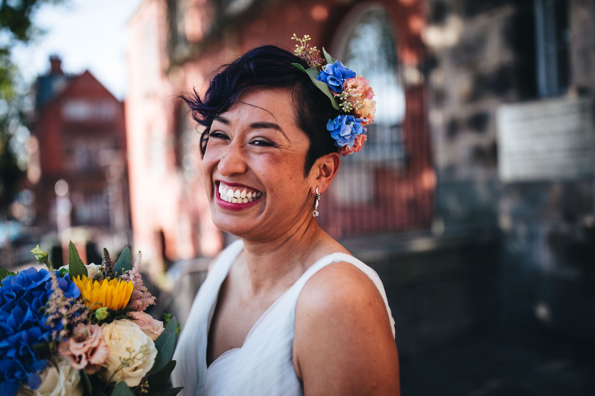 bride arrives smiling at ceremony