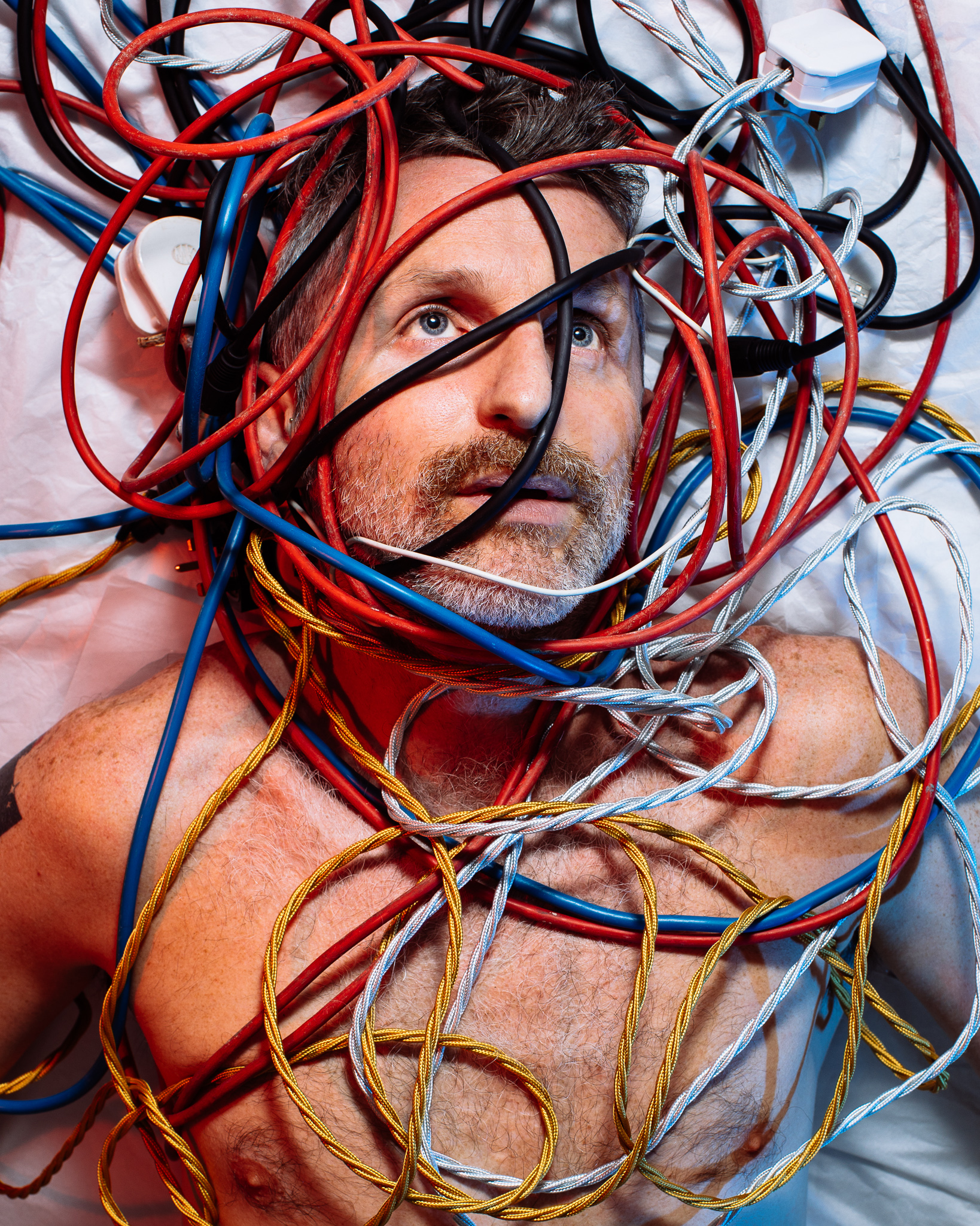 mike is covered in wires because he is of the wired generation