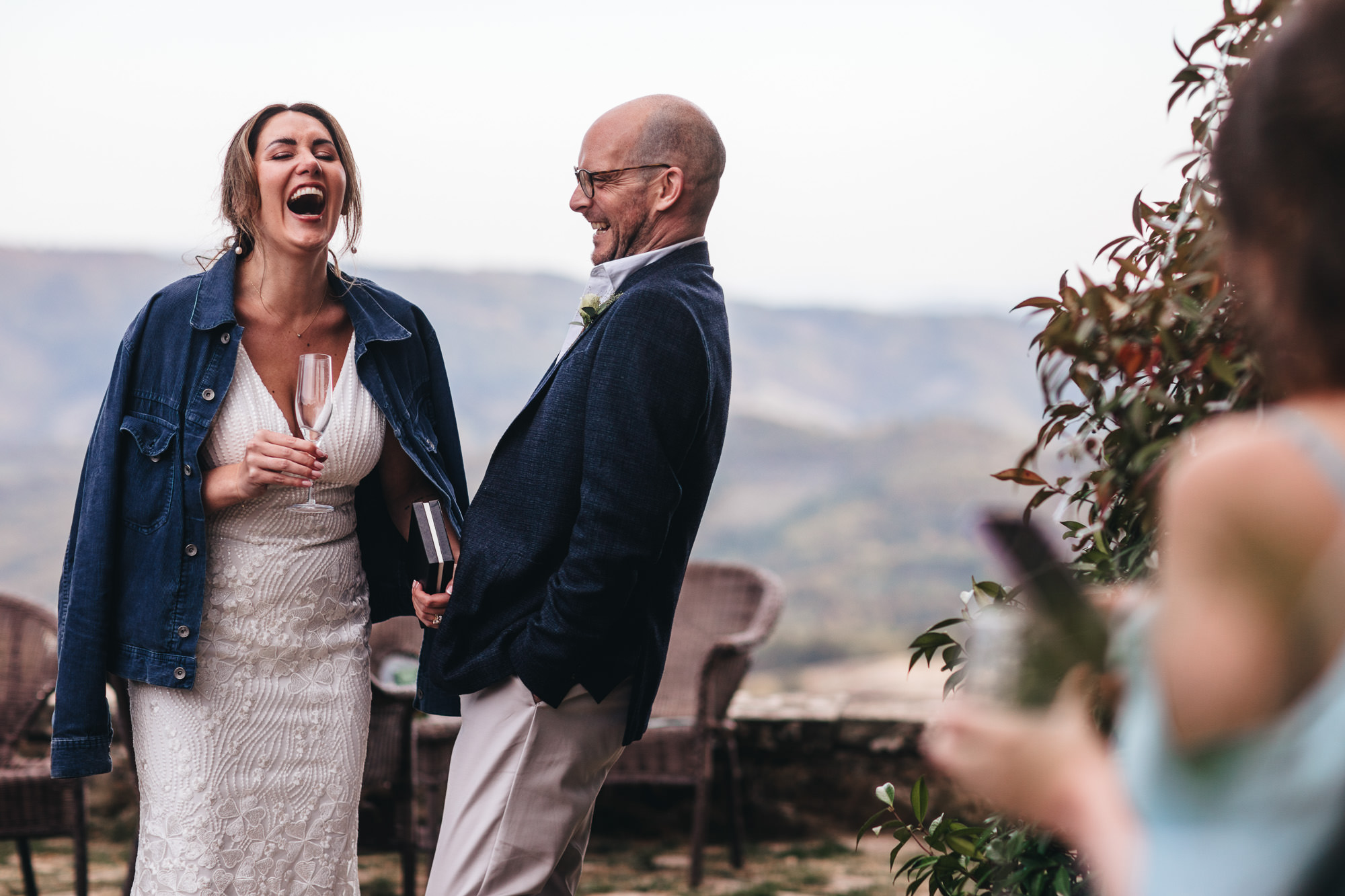 couple find moment funny during the speeches