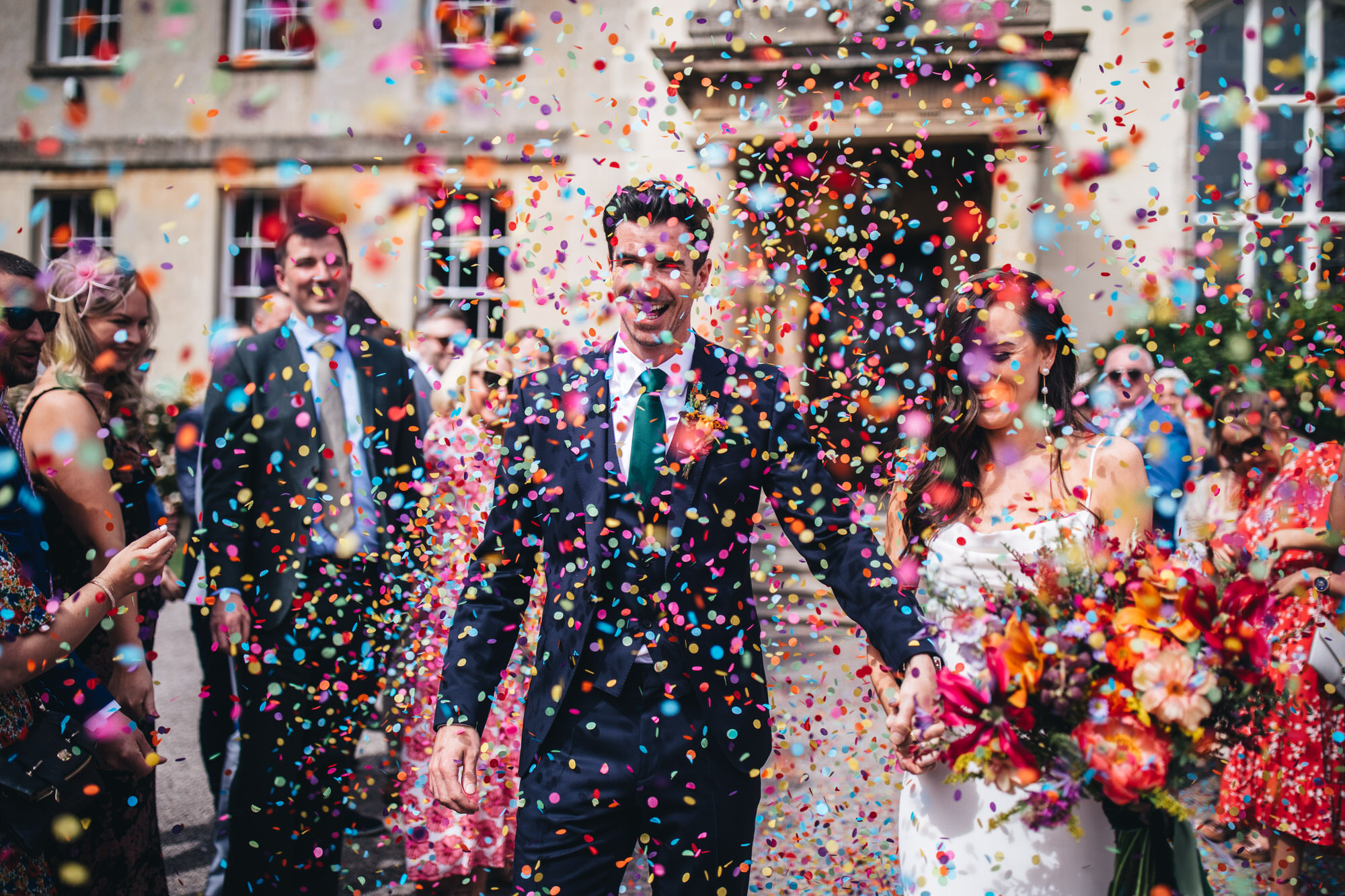 Mike Plunkett Manchester Wedding Photographer confetti colourful